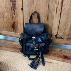 Freebird Distressed Leather Backpack in Black and Brown